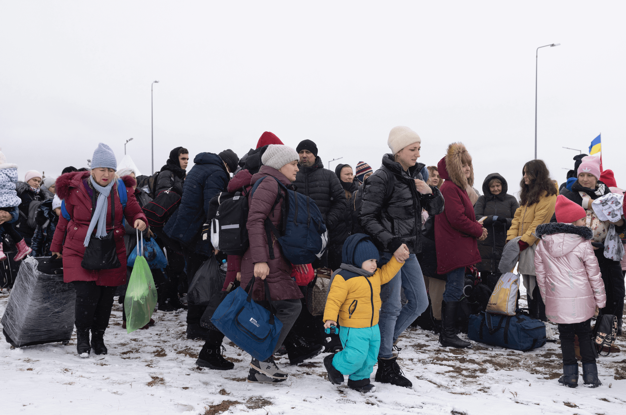 REFUGEES-FLEEING-CONFLICT-MAKE-THEIR-WAY-TO-THE-KRAKOVETS-BORDER-CROSSING-WITH-POLAND